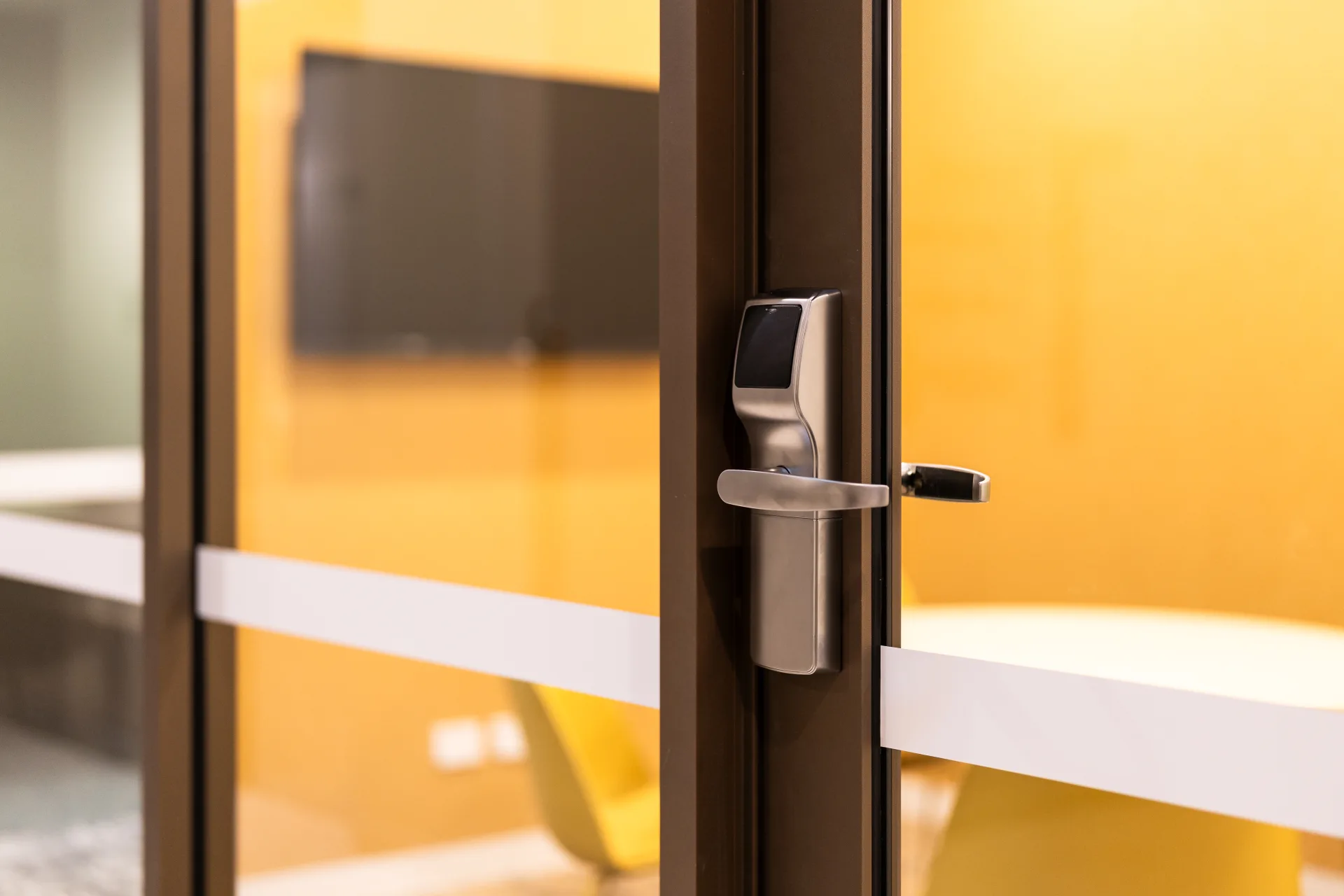 Aluminium-framed glass door with lever hardware at 41 George Street, Brisbane